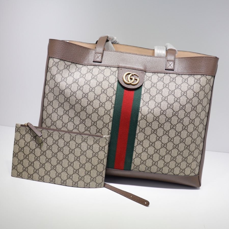 G*u*i shopping bags